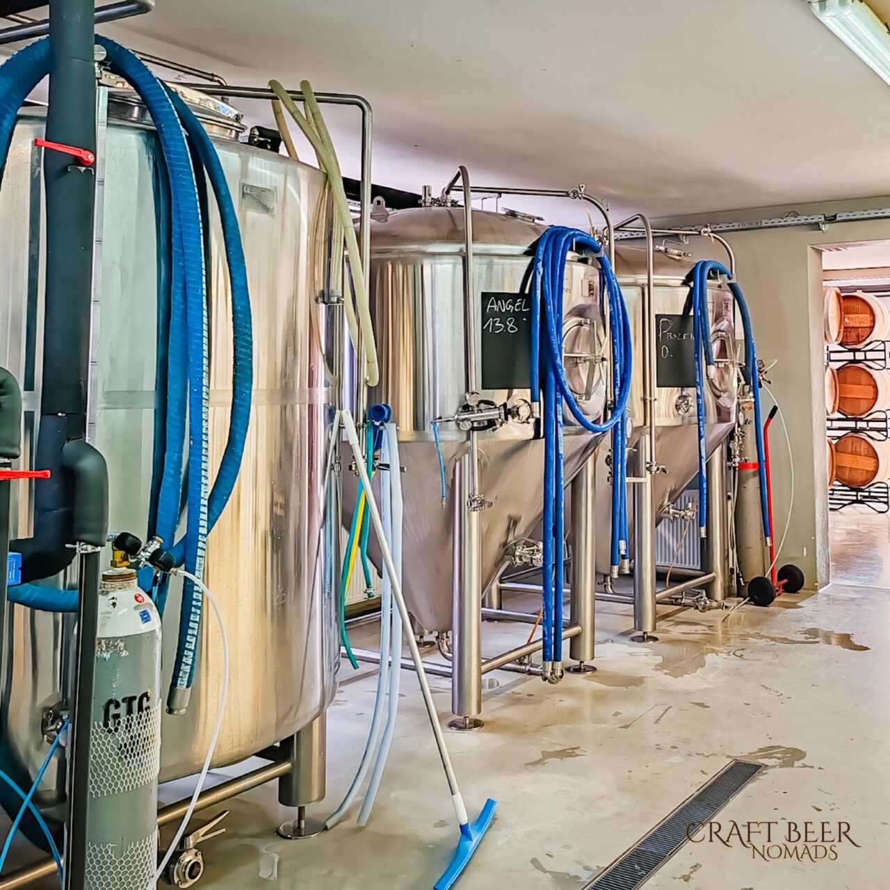 Craft beer in Slovenia: Green Gold and Clef brew amidst hop fields Fermenting vessels in Clef Brewery | Craft beer in Slovenia: Green Gold and Clef brew in the middle of hop fields | Craft Beer Nomads