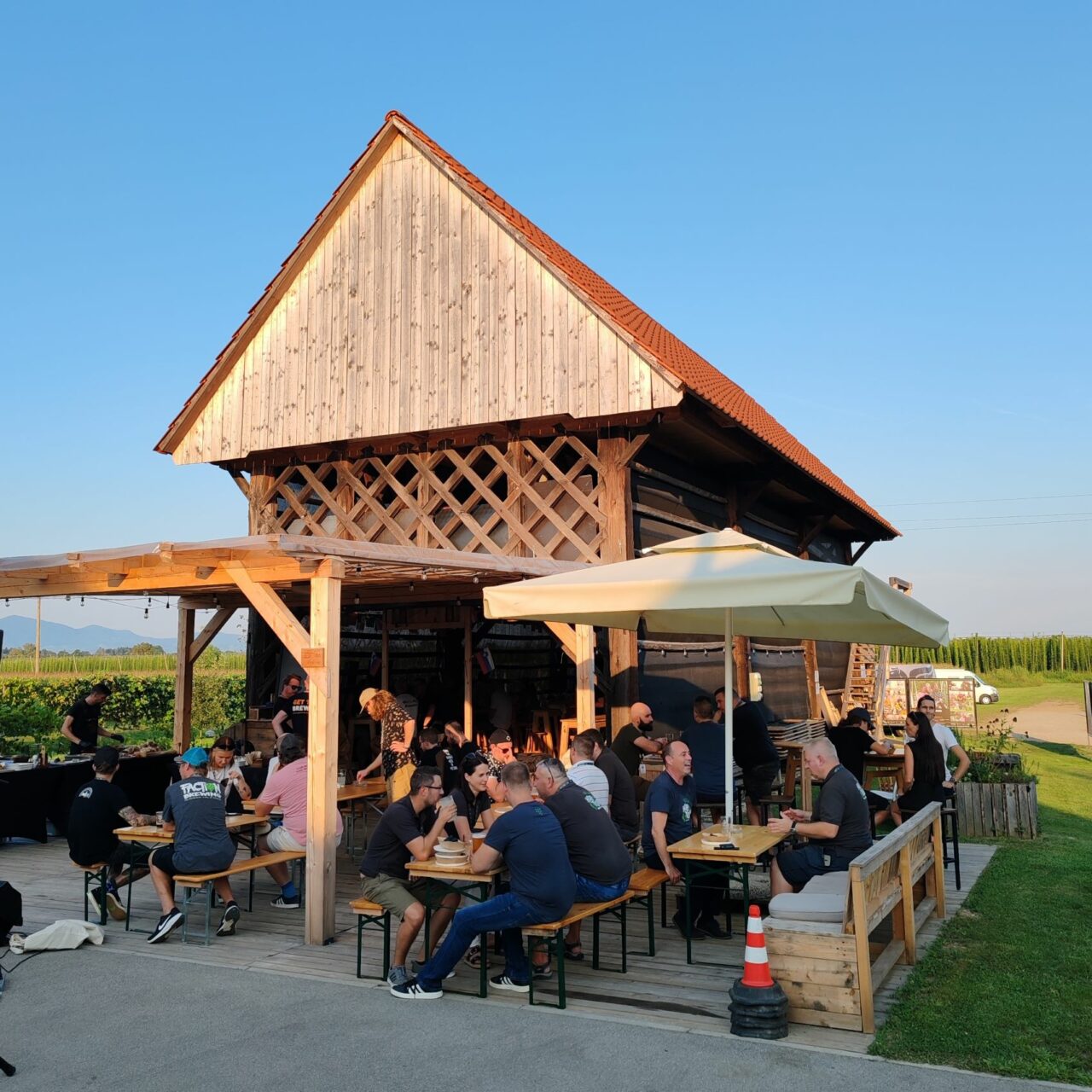 Craft beer in Slovenia: Green Gold and Clef brew amidst hop fields Summer taproom in Clef Brewery | Craft beer in Slovenia: Green Gold and Clef brew in the middle of hop fields | Craft Beer Nomads